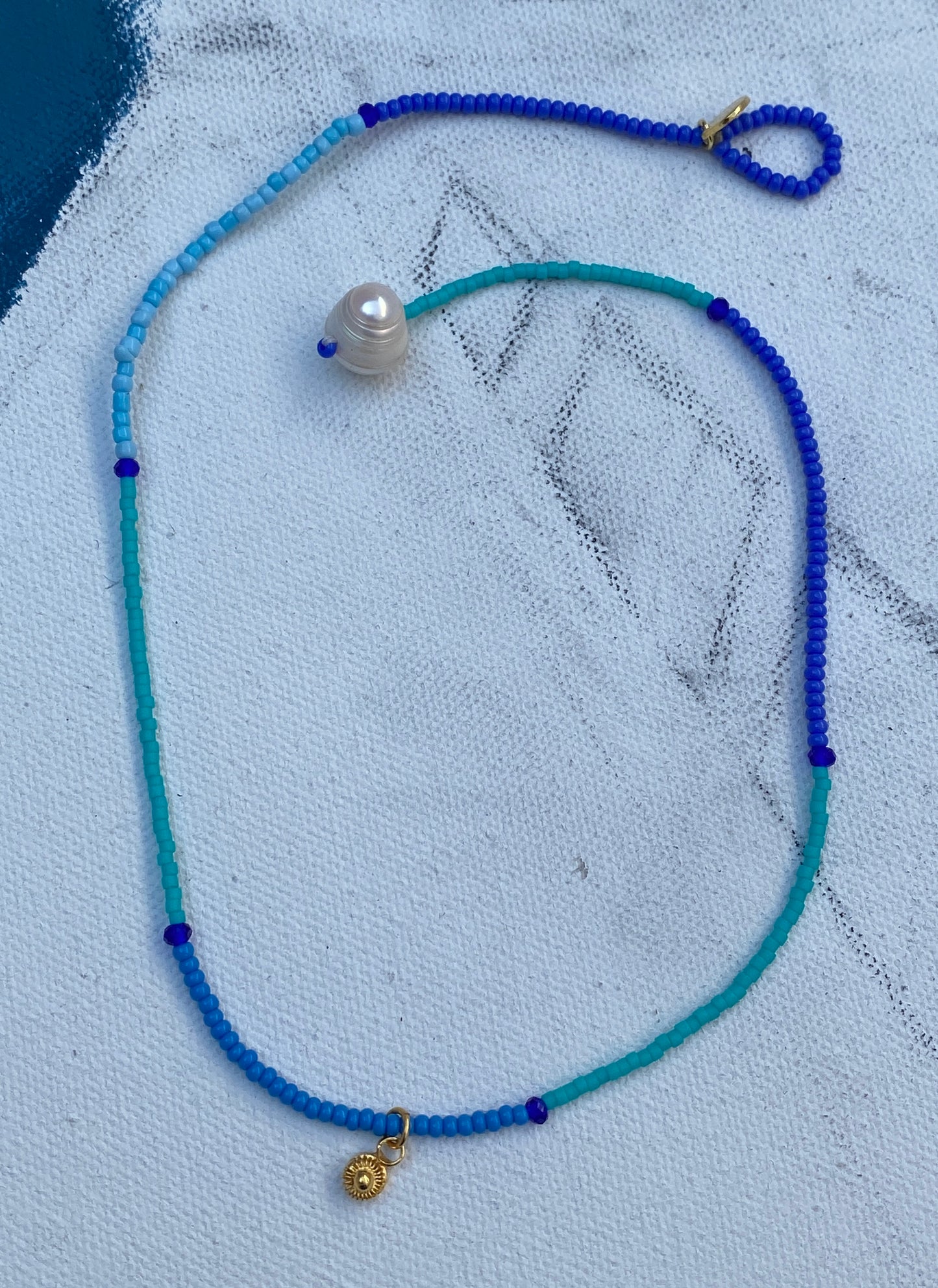 By the sea Necklace with gold pendant
