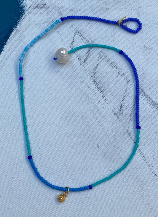 By the sea Necklace with gold pendant